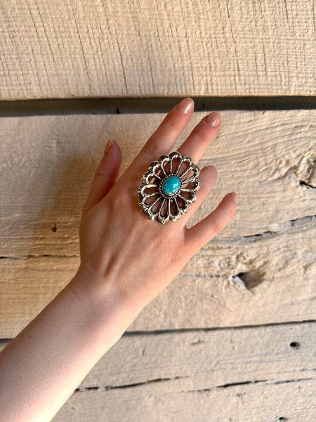 Vintage sterling silver and turquoise sand-casted flower ring