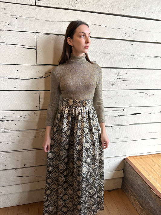 1970s black and gold metallic mock neck dress